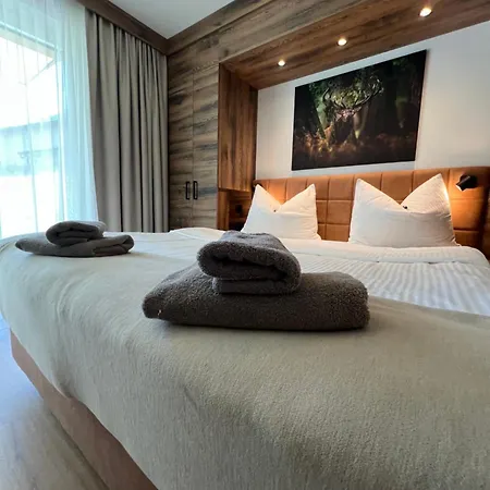 Alpinegold Residenz Aparthotel 4*